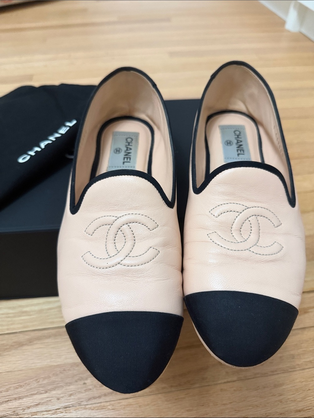 CHANEL Pink Leather Cap-Toe Loafers with Black Trim